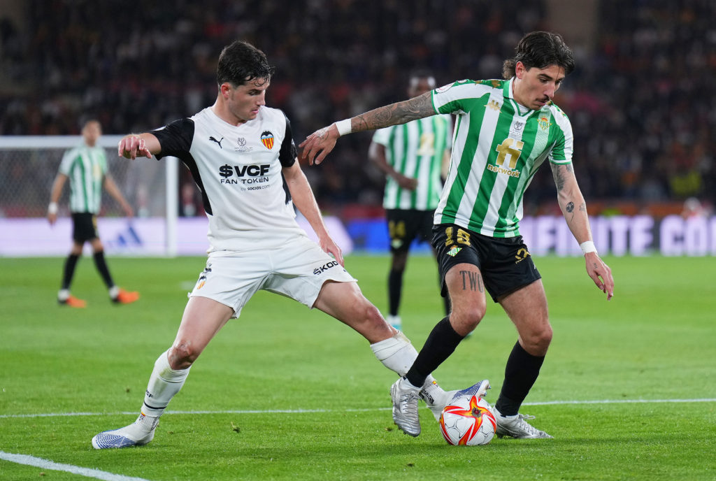 SEVILLE, SPAIN: Hector Bellerin of Real Betis is challenged by Hugo Guillamon of Valencia CF during the Copa del Rey final match between Real Betis and Valencia CF at Estadio La Cartuja on April 23, 2022. (Photo by Angel Martinez/Getty Images)