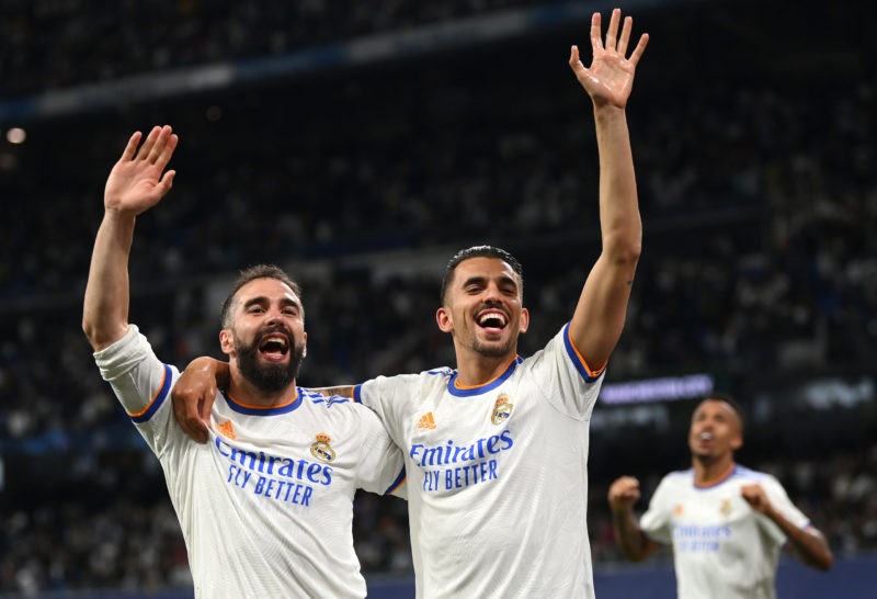MADRID, SPAIN - MAY 04: Daniel Carvajal and Dani Ceballos of Real Madrid celebrate their side's victory and progression to the UEFA Champions League Final after the UEFA Champions League Semi Final Leg Two match between Real Madrid and Manchester City at Estadio Santiago Bernabeu on May 04, 2022 in Madrid, Spain. (Photo by Michael Regan/Getty Images)