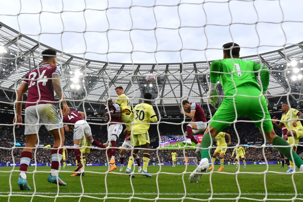 LONDON, ENGLAND: Rob Holding of Arsenal scores their side's first goal during the Premier League match between West Ham United and Arsenal at London Stadium on May 01, 2022. (Photo by Justin Setterfield/Getty Images)