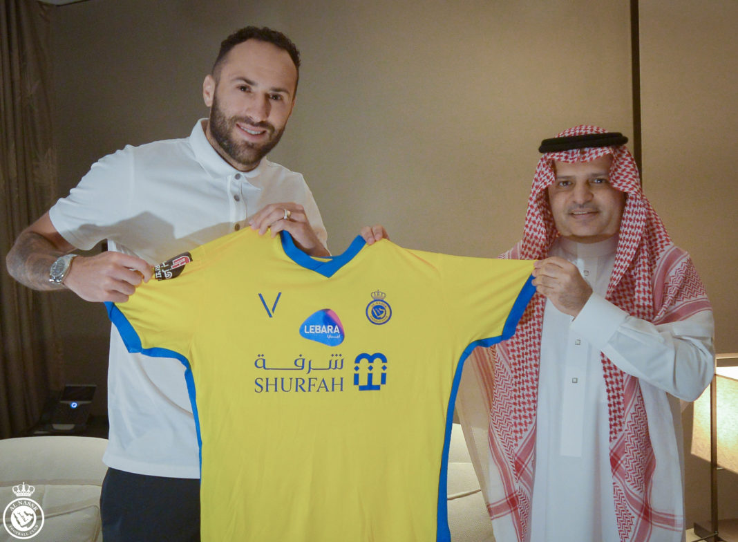 David Ospina holding the Al Nassr shirt with Chairman of the Board of Directors, Mr Musli Al Muammar