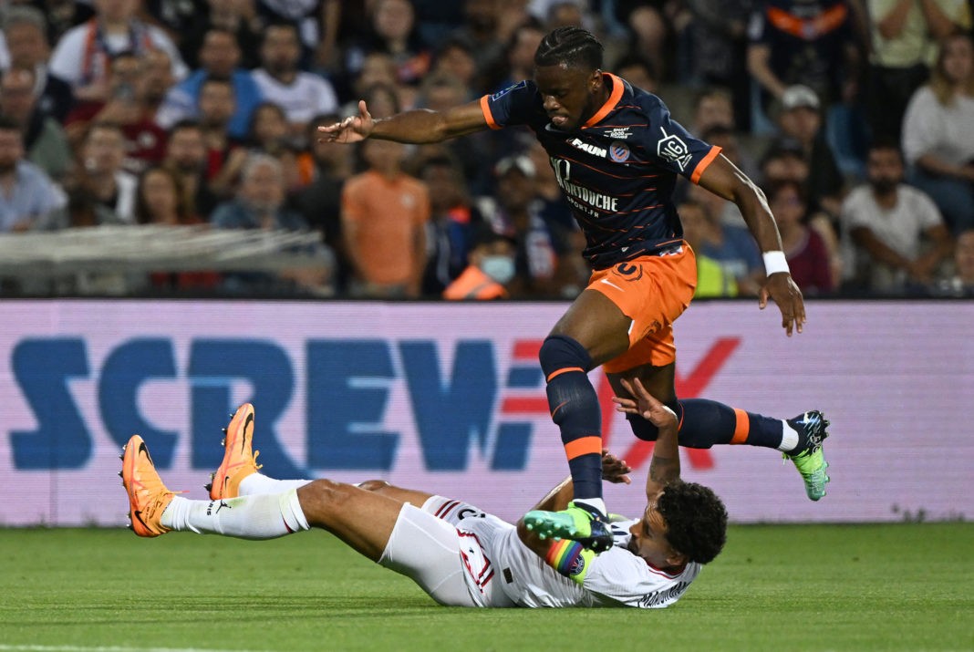Paris Saint-Germain's Marquinhos (L) fights for the ball with Montpellier's Stephy Mavididi (R) during the French L1 football match between Montpellier Herault SC and Paris Saint-Germain on May 14, 2022. (Photo by PASCAL GUYOT/AFP via Getty Images)