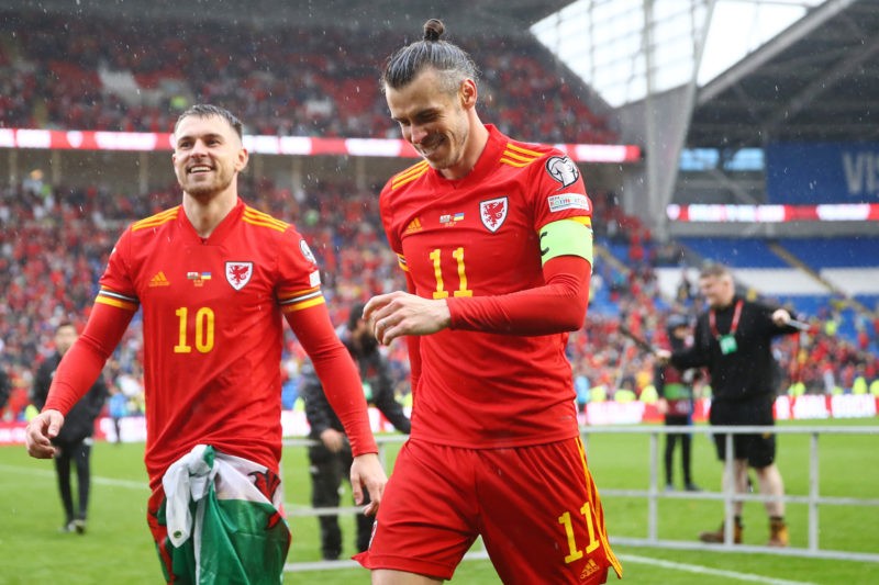 CARDIFF, WALES - JUNE 05: Aaron Ramsey and Gareth Bale of Wales celebrate after their sides victory during the FIFA World Cup Qualifier between Wales and Ukraine at Cardiff City Stadium on June 05, 2022 in Cardiff, Wales. (Photo by Michael Steele/Getty Images)
