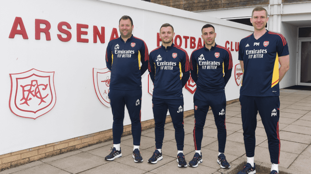 Luke Hobbs, Jack Wilshere, Mehmet Ali, and Per Mertesacker (Photo via Arsenal.com)