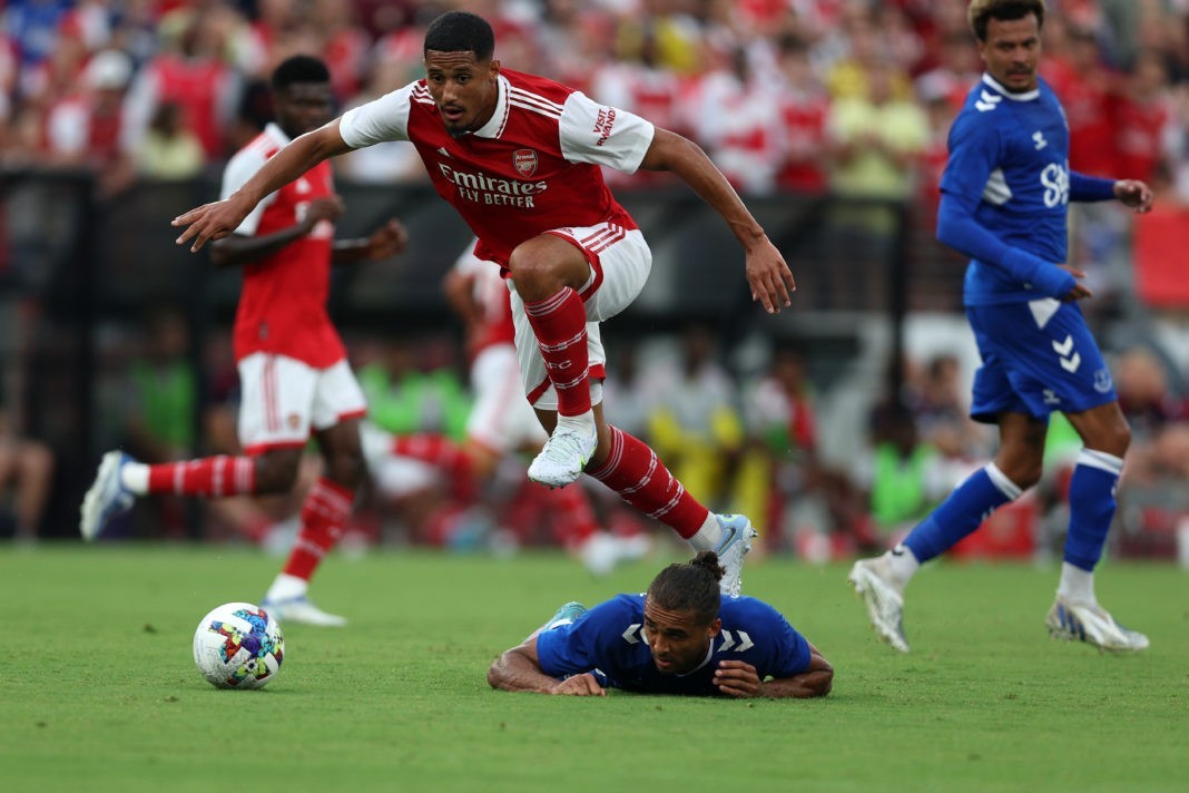 BALTIMORE, MARYLAND: William Saliba #12 of Arsenal and Dominic Calvert-Lewin #9 of Everton go after the ball in the first half during a preseason friendly at M&T Bank Stadium on July 16, 2022. (Photo by Rob Carr/Getty Images)