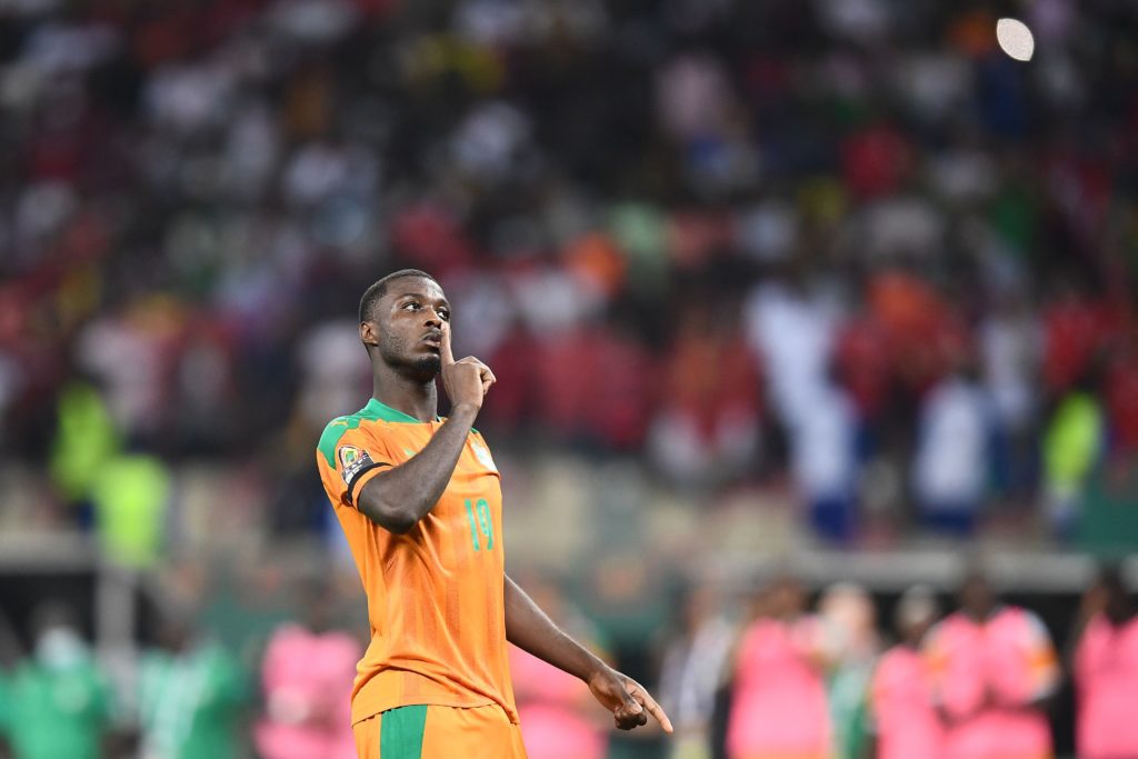 Ivory Coast's forward Nicolas Pepe reacts after scoring a shot in a penalty shoot-out during the Africa Cup of Nations (CAN) 2021 round of 16 football match between Ivory Coast and Egypt at Stade de Japoma in Douala on January 26, 2022. (Photo by CHARLY TRIBALLEAU / AFP) (Photo by CHARLY TRIBALLEAU/AFP via Getty Images)
