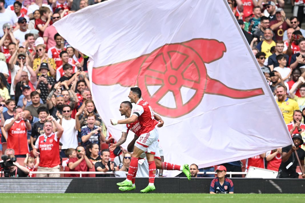 Arsenal's Brazilian forward Gabriel Jesus (back) celebrates with Gabriel Martinelli after scoring his team's fifth goal during a club-friendly football match between Arsenal and Sevilla at the Emirates Stadium in London on July 30, 2022. (Photo by JUSTIN TALLIS/AFP via Getty Images)
