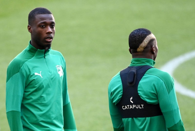 Ivory Coast's forward Nicolas Pepe (L) attends a training session on the eve of the friendly football match between France and Ivory Coast at the Velodrome Stadium in Marseille, southern France on March 24, 2022. (Photo by FRANCK FIFE / AFP) (Photo by FRANCK FIFE/AFP via Getty Images)