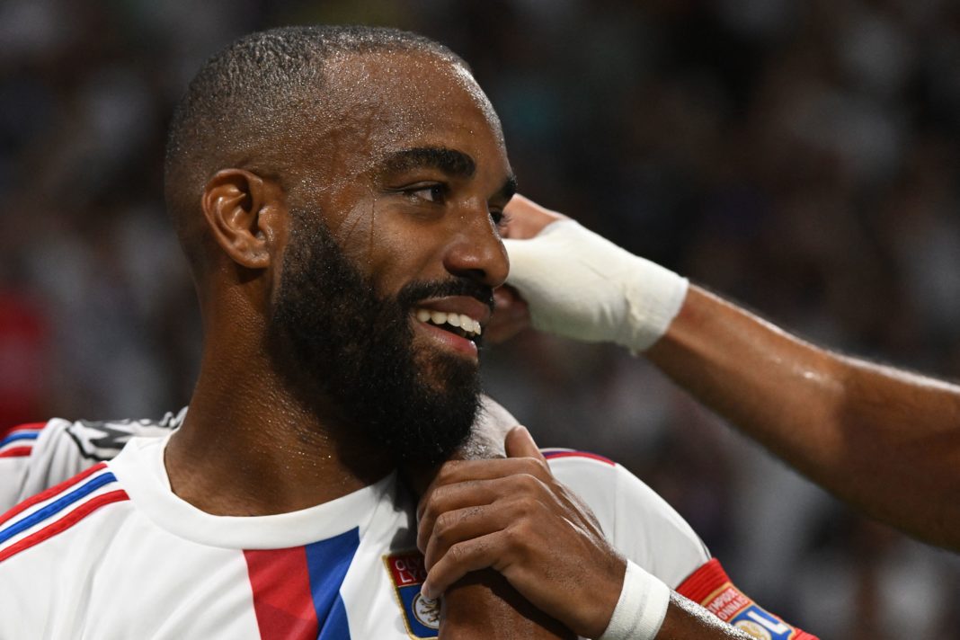 Lyon's French forward Alexandre Lacazette celebrates after scoring his team's second goal during the French Ligue 1 football match between Olympique Lyonnais (OL) and Ajaccio at The Groupama Stadium in Decines-Charpieu, central-eastern France, on August 5, 2022.(Photo by JEAN-PHILIPPE KSIAZEK/AFP via Getty Images)