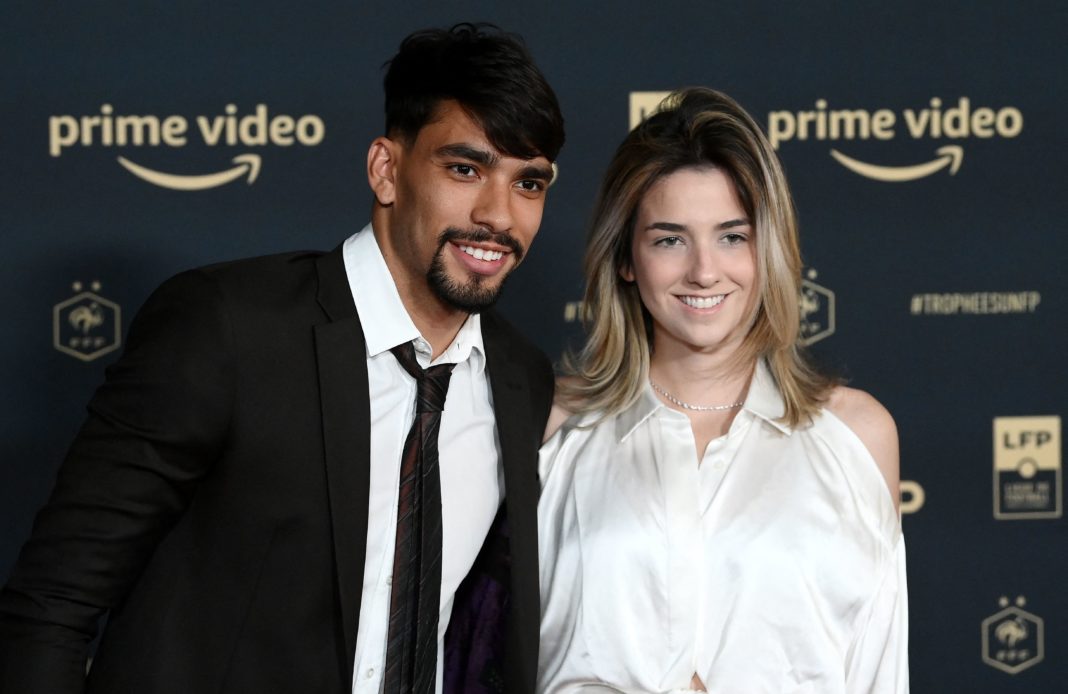 Lyons Brazilian midfielder Lucas Paqueta and his partner pose ahead of the TV show on May 15, 2022 in Paris, as part of the 30th edition of the UNFP (French National Professional Football players Union) trophy ceremony. (Photo by FRANCK FIFE / AFP) (Photo by FRANCK FIFE/AFP via Getty Images)
