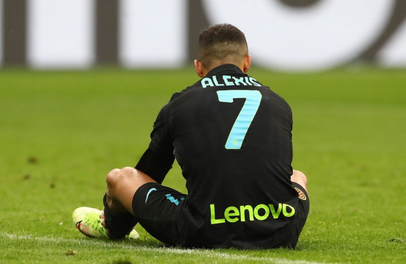 MILAN, ITALY - MAY 06: Alexis Sanchez of FC Internazionale sitting on the field during the Serie A match between FC Internazionale and Empoli FC at Stadio Giuseppe Meazza on May 06, 2022 in Milan, Italy. (Photo by Marco Luzzani/Getty Images)