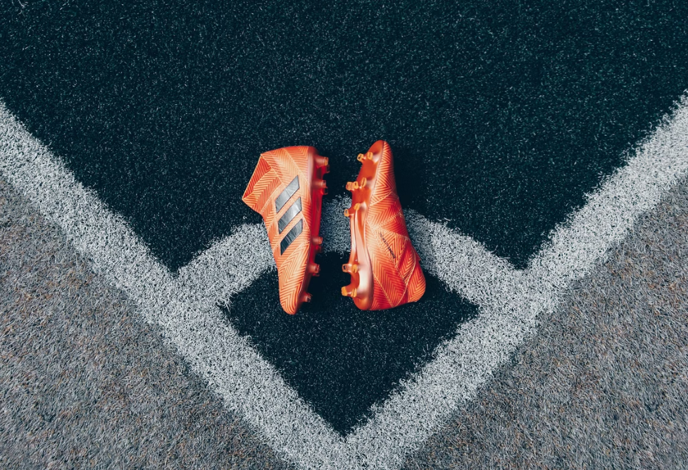 orange football boots