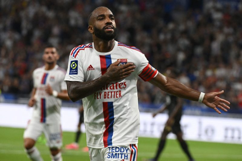 TOPSHOT - Lyon's French forward Alexandre Lacazette celebrates after scoring his team's second goal during the French Ligue 1 football match between Olympique Lyonnais (OL) and Ajaccio at The Groupama Stadium in Decines-Charpieu, central-eastern France, on August 5, 2022.(Photo by JEAN-PHILIPPE KSIAZEK/AFP via Getty Images)