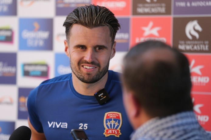 Carl Jenkinson after signing for the Newcastle Jets (Photo via NewcastleJetsFC.com.au)