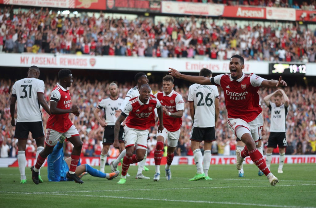 LONDON, ENGLAND: William Saliba (R) and Gabriel Magalhaes (C) of Arsenal celebrate their side's second goal during the Premier League match between Arsenal FC and Fulham FC at Emirates Stadium on August 27, 2022. (Photo by Eddie Keogh/Getty Images)