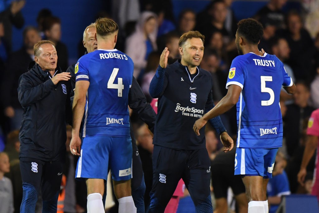BIRMINGHAM, ENGLAND: John Eustace, Head Coach of Birmingham City, shakes hands with Auston Trusty of Birmingham City after the final whistle of the Sky Bet Championship between Birmingham City and Huddersfield Town at St Andrew's Stadium on August 05, 2022. (Photo by Tony Marshall/Getty Images)