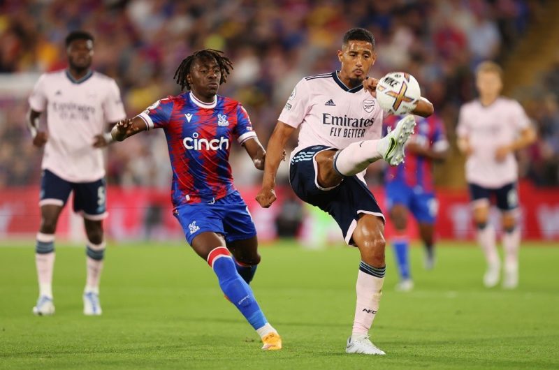 LONDON, ENGLAND: Eberechi Eze of Crystal Palace challenges William Saliba of Arsenal during the Premier League match between Crystal Palace and Arsenal FC at Selhurst Park on August 05, 2022. (Photo by Julian Finney/Getty Images)