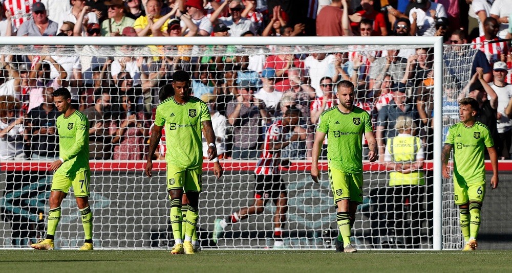 (L-R) Manchester United's Cristiano Ronaldo, Marcus Rashford, Luke Shaw, and Lisandro Martínez react to going three behind during the English Premier League football match between Brentford and Manchester United at Brentford Community Stadium in London on August 13, 2022. (Photo by IAN KINGTON/AFP via Getty Images)