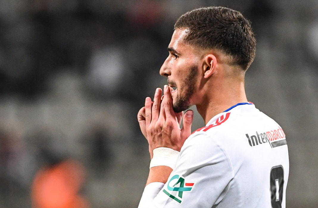 Lyon's French midfielder Houssem Aouar reacts during the French Cup round of 64 football match between Paris FC and Olympique Lyonnais (OL) at the Charlety stadium in Paris, on December 17, 2021. (Photo by BERTRAND GUAY/AFP via Getty Images)