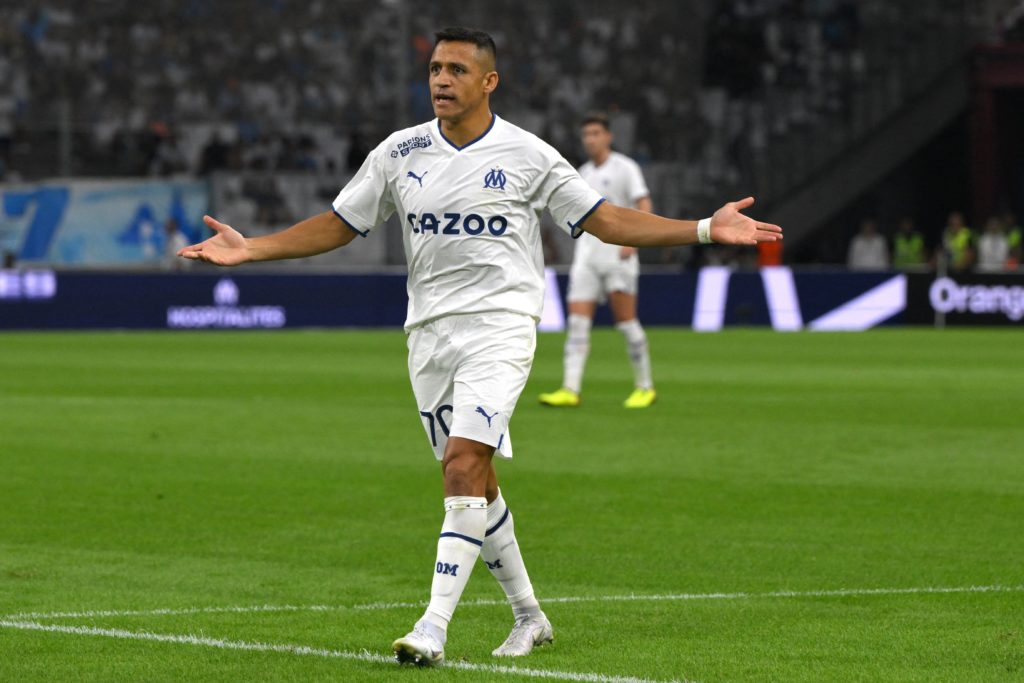 Marseille's Chilean forward Alexis Sanchez reacts during the French L1 football match between Olympique Marseille (OM) and FC Nantes at Stade Velodrome in Marseille, southern France on August 20, 2022. (Photo by NICOLAS TUCAT / AFP)