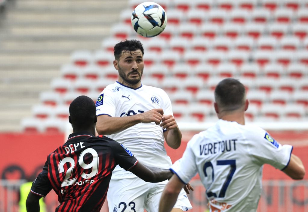 Marseille's Bosnian defender Sead Kolasinac (C) and Marseille's French midfielder Jordan Veretout (R) fight for the ball with Nice's Ivorian forward Nicolas Pepe (L) during the French L1 football match between OGC Nice and Olympique Marseille (OM) at the Allianz Riviera Stadium in Nice, south-eastern France, on August 28, 2022. (Photo by VALERY HACHE/AFP via Getty Images)