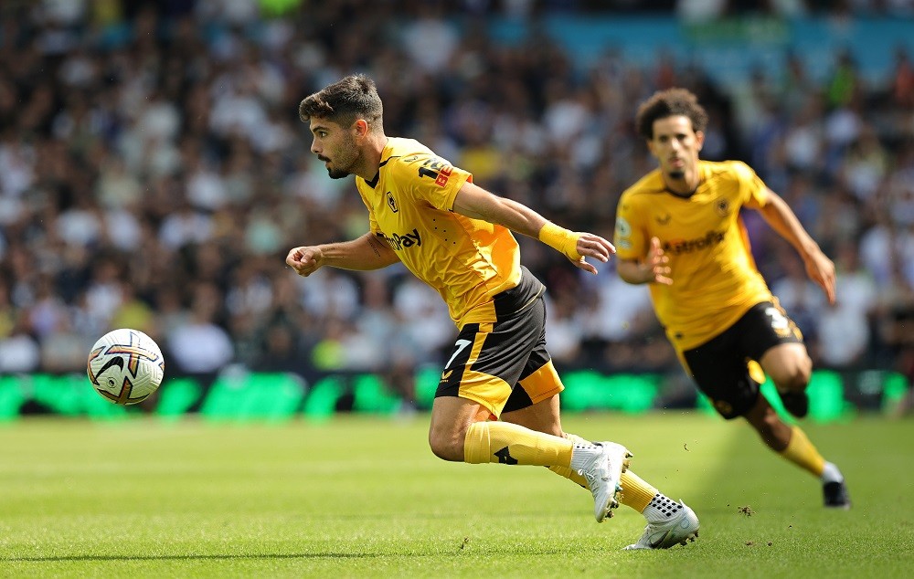 LEEDS, ENGLAND: Pedro Neto of Wolverhampton Wanderers runs with the ball during the Premier League match between Leeds United and Wolverhampton Wanderers at Elland Road on August 06, 2022. (Photo by David Rogers/Getty Images)