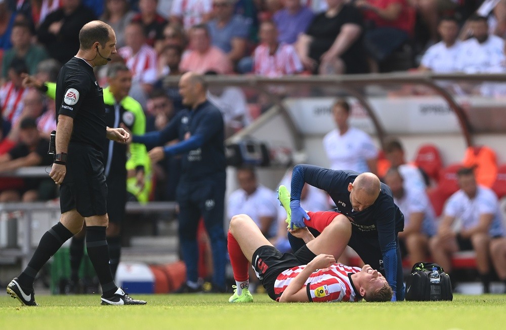 SUNDERLAND, ENGLAND: Sunderland player Dan Ballard receives treatment during the Sky Bet Championship between Sunderland and Queens Park Rangers at Stadium of Light on August 13, 2022. (Photo by Stu Forster/Getty Images)