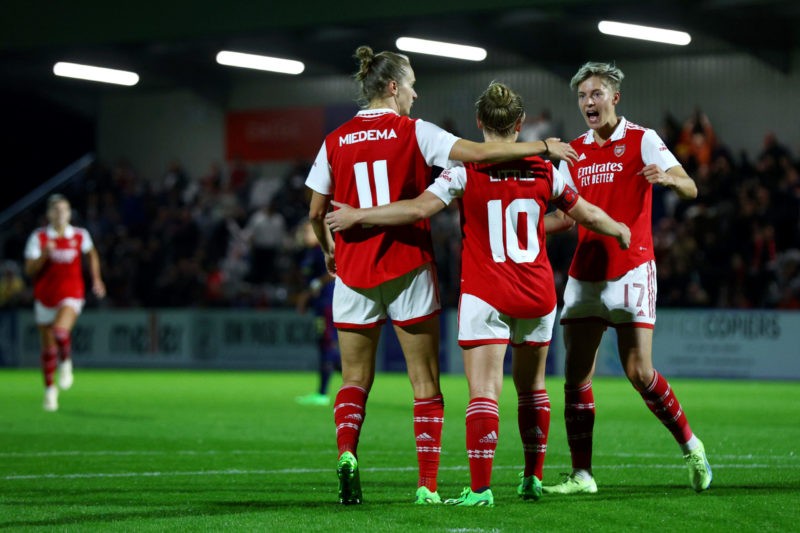 BOREHAMWOOD, ENGLAND - SEPTEMBER 20: Kim Little of Arsenal celebrates with teammates Vivianne Miedema and Lina Hurtig after scoring their team's second goal from the penalty spot during the UEFA Women´s Champions League Second Qualifying Round First Leg match between Arsenal and AFC Ajax at Meadow Park on September 20, 2022 in Borehamwood, England. (Photo by Clive Rose/Getty Images)