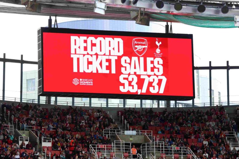 LONDON, ENGLAND - SEPTEMBER 24: An LED board inside the stadium displays a message reading "record ticket sales" during the FA Women's Super League match between Arsenal and Tottenham Hotspur at Emirates Stadium on September 24, 2022 in London, England. (Photo by Clive Rose/Getty Images)