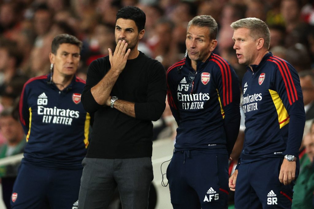 Arsenal's Spanish manager Mikel Arteta (2L) stands with his coaching team during the English Premier League football match between Arsenal and Aston Villa at the Emirates Stadium in London on August 31, 2022. - (Photo by ADRIAN DENNIS/AFP via Getty Images)