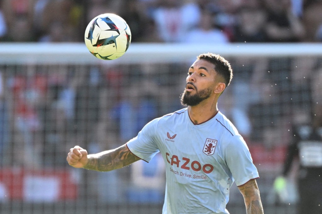 Aston Villas midfielder Douglas Luiz looks eyes the ball during the friendly football match between Stade Rennais and Aston Villa, at the Roazhon Park stadium in Rennes, western France on July 30, 2022. (Photo by Damien Meyer / AFP) (Photo by DAMIEN MEYER/AFP via Getty Images)