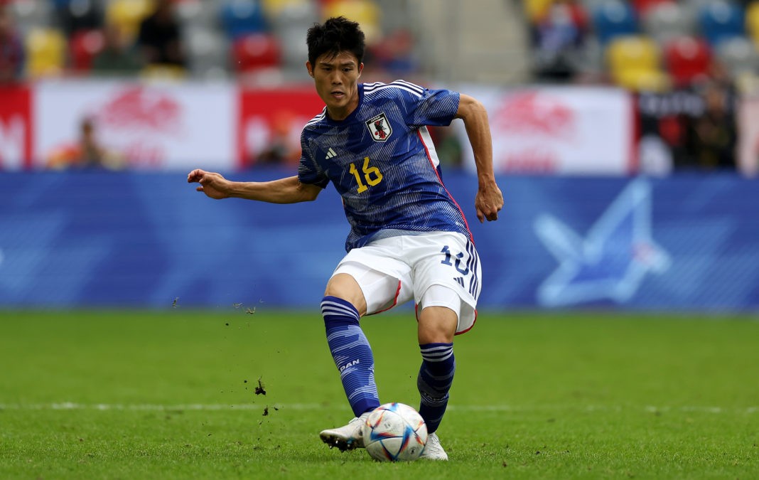 DUESSELDORF, GERMANY: Takehiro Tomiyasu of Japan runs with the ball during the international friendly match between Japan and the United States at Merkur Spiel-Arena on September 23, 2022. (Photo by Lars Baron/Getty Images)