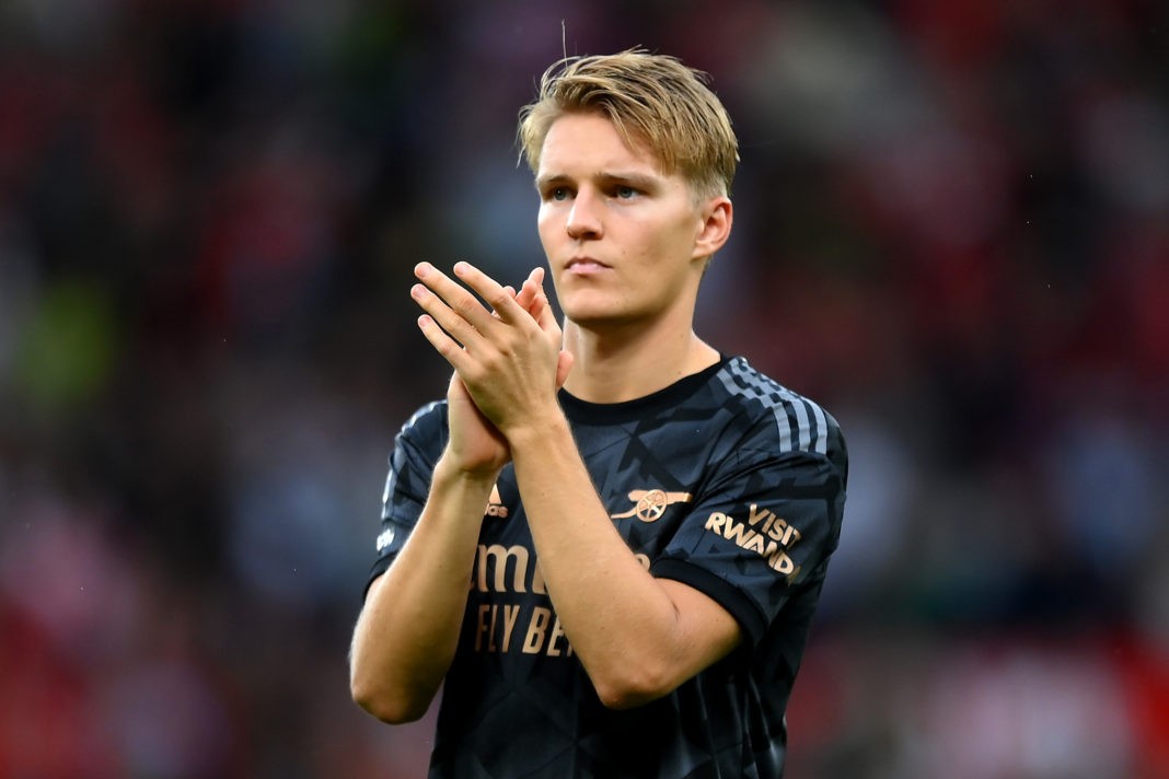 MANCHESTER, ENGLAND - SEPTEMBER 04: Martin Oedegaard of Arsenal applauds fans after the Premier League match between Manchester United and Arsenal FC at Old Trafford on September 04, 2022 in Manchester, England. (Photo by Shaun Botterill/Getty Images)