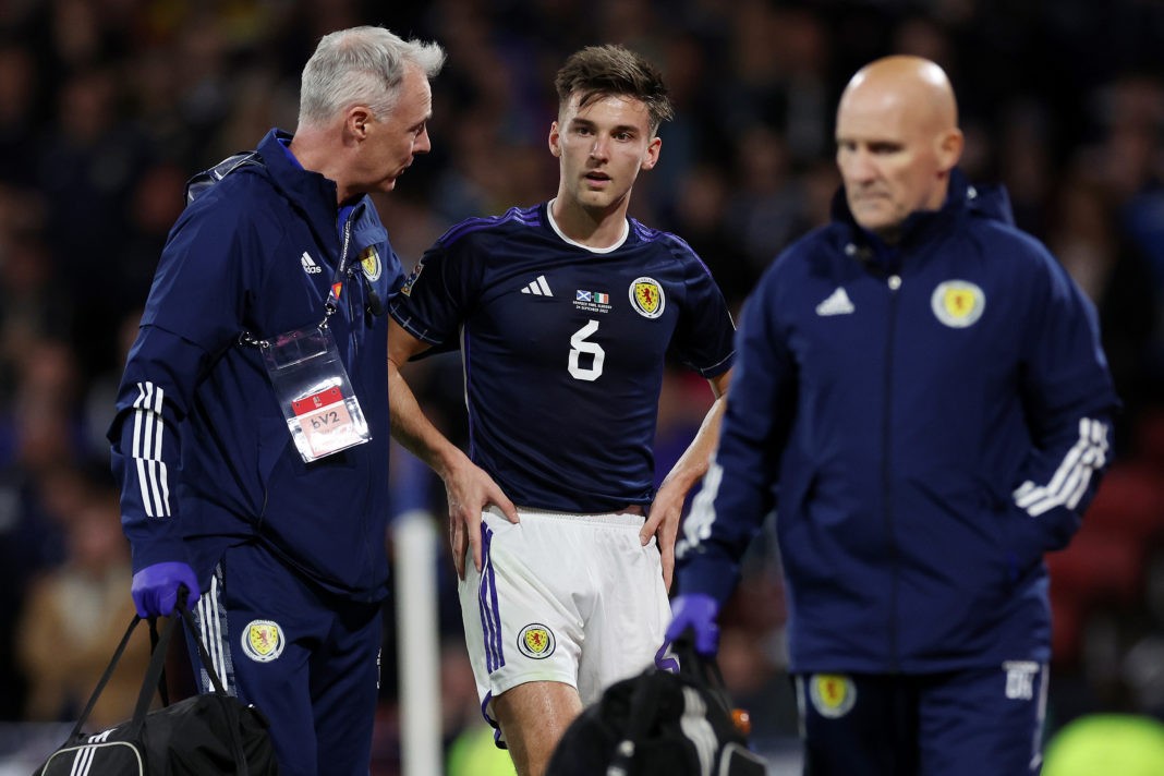 GLASGOW, SCOTLAND - SEPTEMBER 24: Kieran Tierney of Scotland leaves the field after recieving medical treatment during the UEFA Nations League League B Group 1 match between Scotland and Republic of Ireland at Hampden Park National Stadium on September 24, 2022 in Glasgow, Scotland. (Photo by Ian MacNicol/Getty Images)