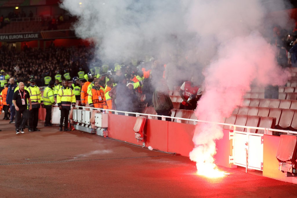 LONDON, ENGLAND - OCTOBER 20: A flare is seen following the UEFA Europa League group A match between Arsenal FC and PSV Eindhoven at Emirates Stadium on October 20, 2022 in London, England. (Photo by Julian Finney/Getty Images)