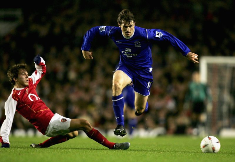 LONDON - NOVEMBER 9: Kevin Kilbane of Everton jumps a tackle from Arturo Lupoli of Arsenal during the Carling Cup Fourth Round match between Arsenal and Everton at Highbury on November 9, 2004 in London, England. (Photo by Ben Radford/Getty Images)