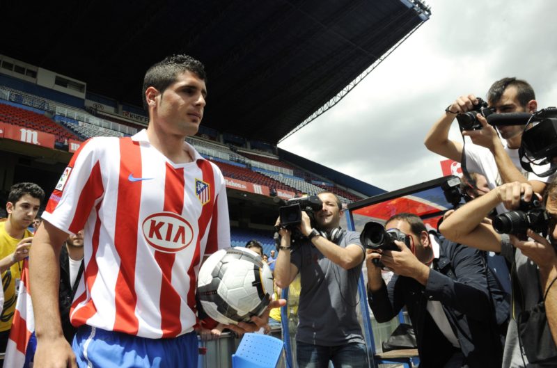 Atletico Madrid's newly signed Fran Merida of Spain poses during his official presentation after signing with the Atletico in Madrid on May 28, 2010. AFP PHOTO / DOMINIQUE FAGET (Photo credit should read DOMINIQUE FAGET/AFP via Getty Images)