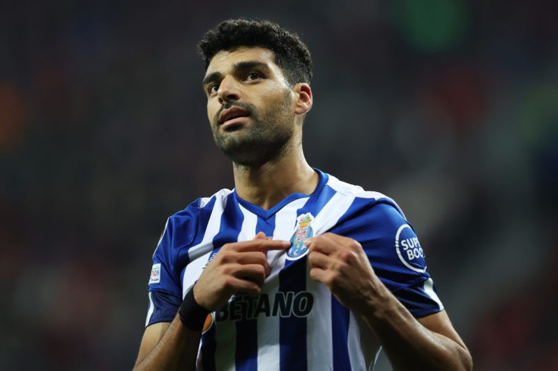 LEVERKUSEN, GERMANY - OCTOBER 12: Mehdi Taremi of FC Porto celebrates after scoring their team's third goal from the penalty spot during the UEFA Champions League group B match between Bayer 04 Leverkusen and FC Porto at BayArena on October 12, 2022 in Leverkusen, Germany. (Photo by Alex Grimm/Getty Images)