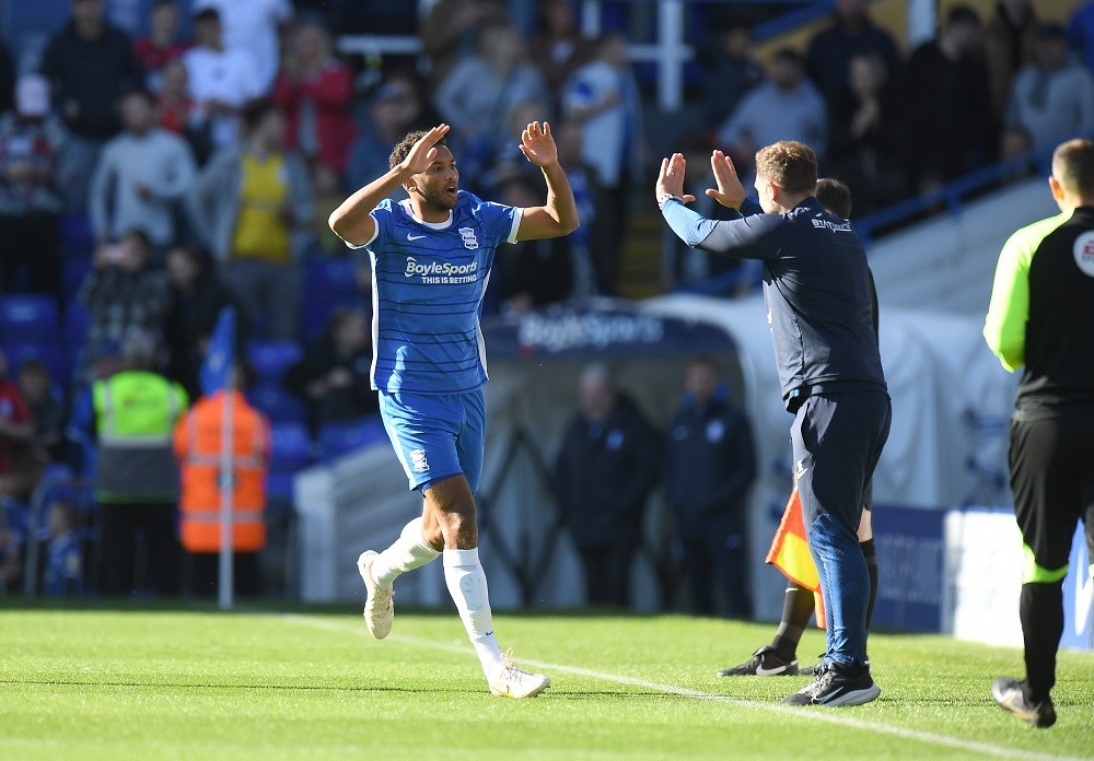 BIRMINGHAM, ENGLAND: Auston Trusty of Birmingham City celebrates scoring their first goal of the match with Head Coach John Eustace during the Sky Bet Championship between Birmingham City and Bristol City at St Andrews (stadium) on October 08, 2022. (Photo by Tony Marshall/Getty Images)