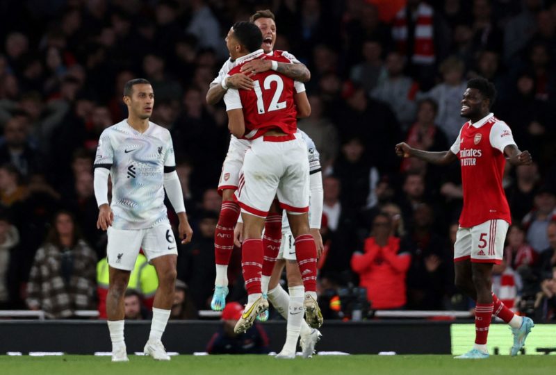 Arsenal's English defender Ben White and Arsenal's French defender William Saliba celebrate winning the English Premier League football match between Arsenal and Liverpool at the Emirates Stadium in London on October 9, 2022.