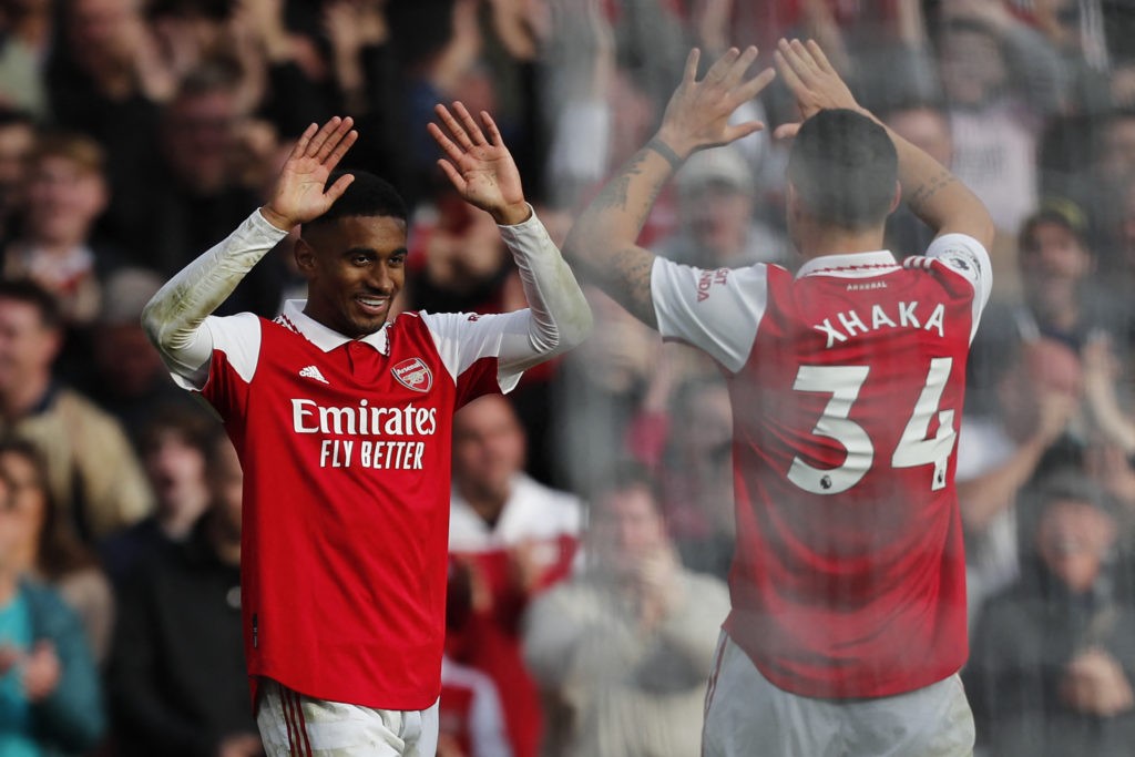 Arsenal's English midfielder Reiss Nelson (L) celebrates with Arsenal's Swiss midfielder Granit Xhaka (R) after scoring their third goal during the English Premier League football match between Arsenal and Nottingham Forest at the Emirates Stadium in London on October 30, 2022.(Photo by IAN KINGTON/AFP via Getty Images)