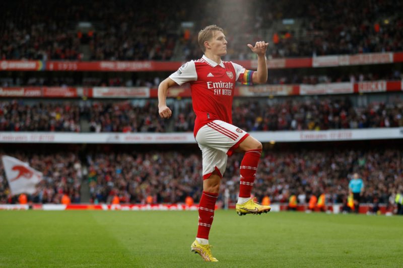 Arsenal's Norwegian midfielder Martin Odegaard (C) celebrates after scoring their fifth goal during the English Premier League football match between Arsenal and Nottingham Forest at the Emirates Stadium in London on October 30, 2022. (Photo by IAN KINGTON/AFP via Getty Images)