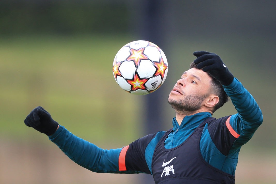Liverpool's English midfielder Alex Oxlade-Chamberlain controls the ball as he attends a team training session at Anfield Stadium in Liverpool, north west England, on April 26, 2022, on the eve of their UEFA Champions League semi-final first leg football match against Villareal. (Photo by Lindsey Parnaby / AFP) (Photo by LINDSEY PARNABY/AFP via Getty Images)