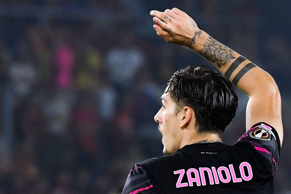 AS Roma's Italian midfielder Nicolo Zaniolo gestures during the UEFA Europa League Group C group stage football match between AS Roma and HJK Helsinki on September 15, 2022 at the Olympic stadium in Rome. (Photo by TIZIANA FABI/AFP via Getty Images)