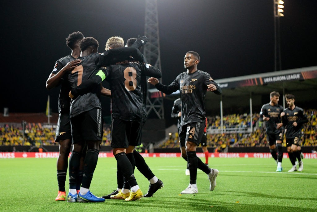 BODO, NORWAY - OCTOBER 13: Bukayo Saka of Arsenal celebrates scoring their side's first goal with teammates during the UEFA Europa League group A match between FK Bodo/Glimt and Arsenal FC at Aspmyra Stadion on October 13, 2022 in Bodo, Norway. (Photo by David Lidstrom/Getty Images)