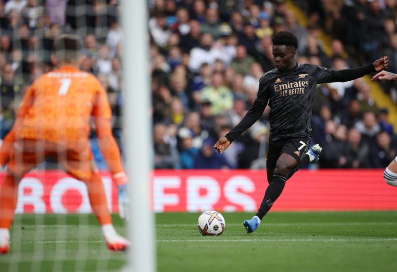 LEEDS, ENGLAND - OCTOBER 16: Bukayo Saka of Arsenal scores their team's first goal during the Premier League match between Leeds United and Arsenal FC at Elland Road on October 16, 2022 in Leeds, England. (Photo by Eddie Keogh/Getty Images)