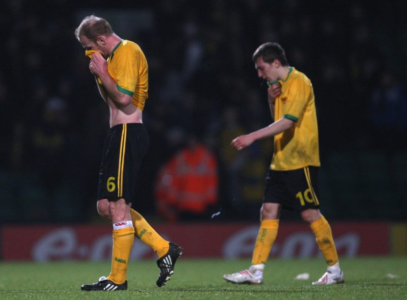 NORWICH, UNITED KINGDOM - JANUARY 13: Gary Doherty (L) and Arturo Lupoli of Norwich leave the field looking dejected after their team's defeat during the FA Cup sponsored by E.on Third Round Replay match between Norwich City and Charlton Athletic at Carrow Road on January 13, 2009 in Norwich, England. (Photo by Hamish Blair/Getty Images)