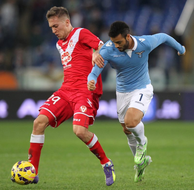 ROME, ITALY - DECEMBER 02: Felipe Anderson (R) of SS Lazio competes for the ball with Arturo Lupoli of AS Varese during the TIM Cup match between SS Lazio and AS Varese at Stadio Olimpico on December 2, 2014 in Rome, Italy. (Photo by Paolo Bruno/Getty Images)