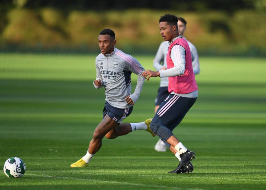 Reuell Walters (R) in training with Arsenal (Photo via Arsenal.com)