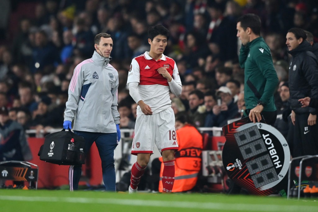 LONDON, ENGLAND - NOVEMBER 03: Takehiro Tomiyasu of Arsenal goes off injured during the UEFA Europa League group A match between Arsenal FC and FC Zurich at Emirates Stadium on November 03, 2022 in London, England. (Photo by Justin Setterfield/Getty Images)
