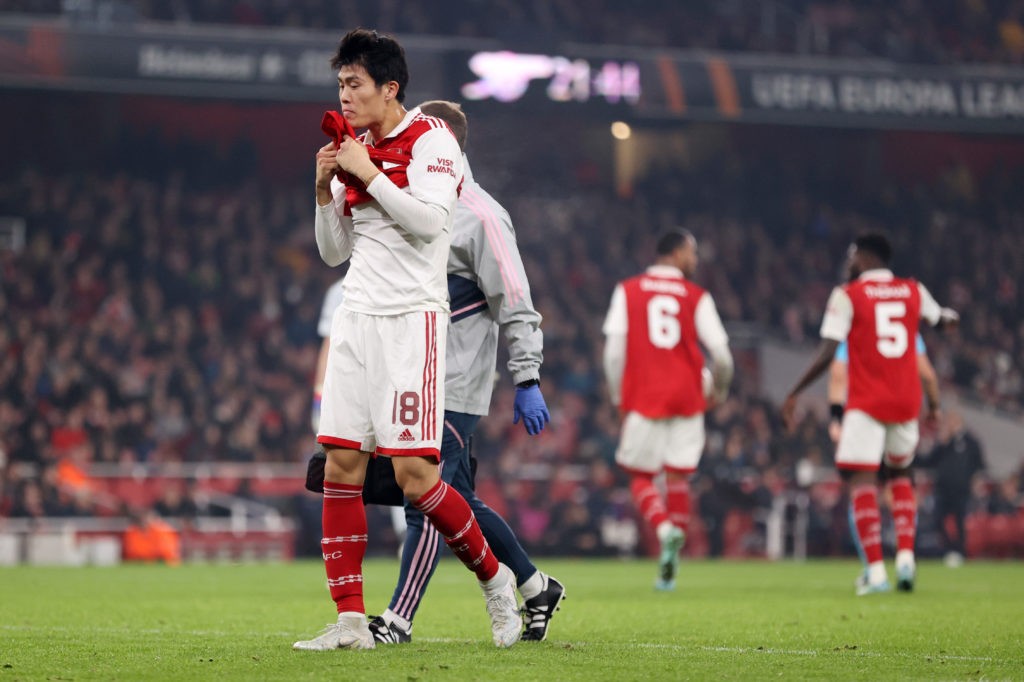 LONDON, ENGLAND - NOVEMBER 03: Takehiro Tomiyasu of Arsenal reacts while leaving the pitch injured during the UEFA Europa League group A match between Arsenal FC and FC Zürich at Emirates Stadium on November 03, 2022 in London, England. (Photo by Ryan Pierse/Getty Images)